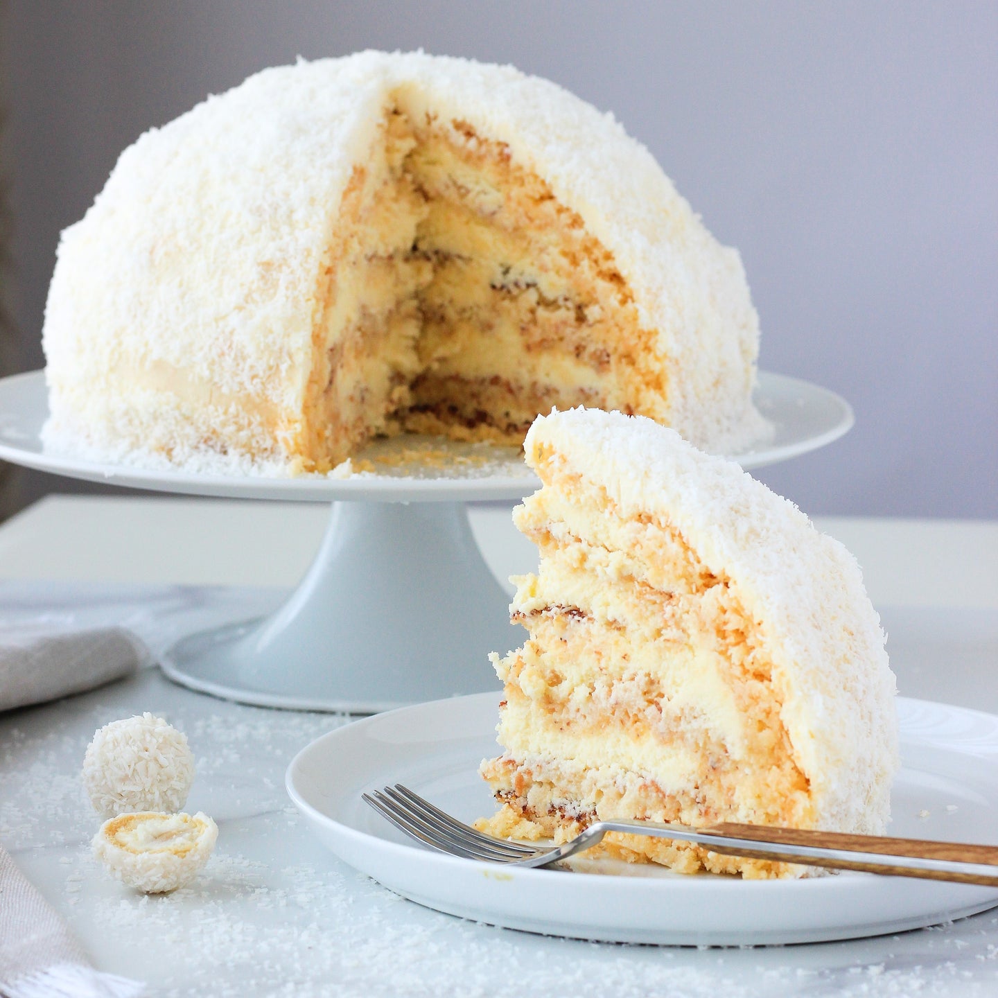 raffaello cake: almond cake, coconut custard, & coconut swiss meringue  buttercream! : r/Baking